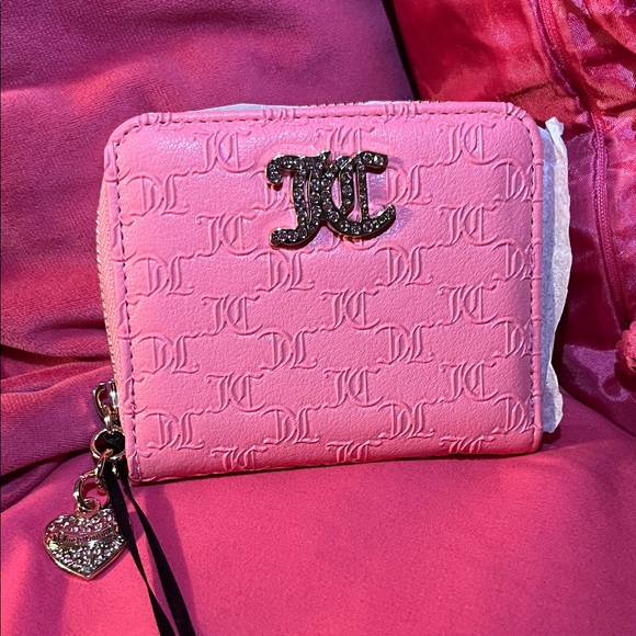 Juicy Couture Handbags - Juicy Couture Pink Embossed Zip Around Wallet with Charm